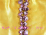 five strands purple color teeth shaped shell strands